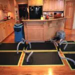 a home experiencing water damage restoration via hardwood floor drying